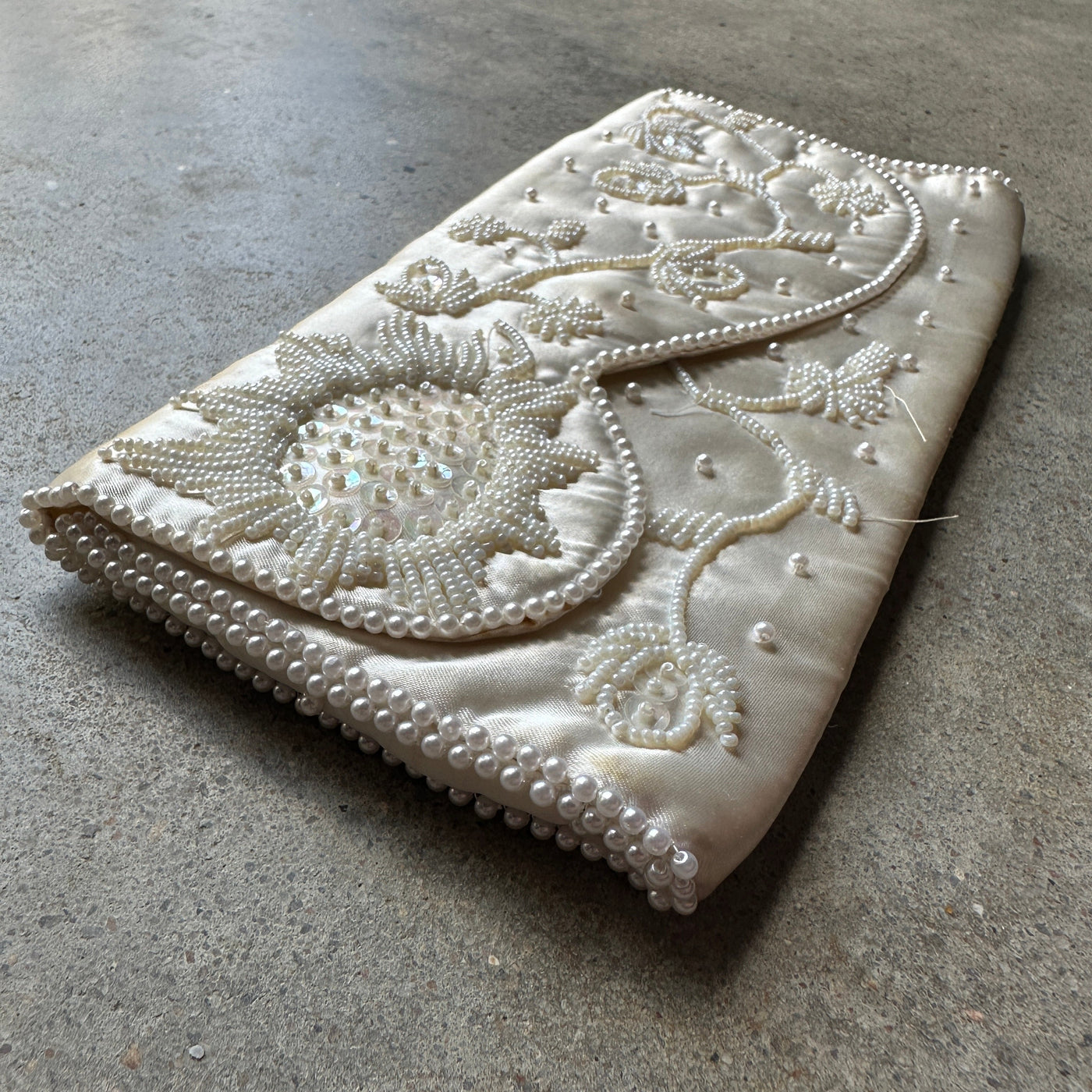 “Bon Soir” White beaded silk clutch
