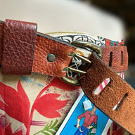 Brown leather belt with two posts
