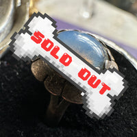 Opal Ring with Sterling Silver Flower Setting