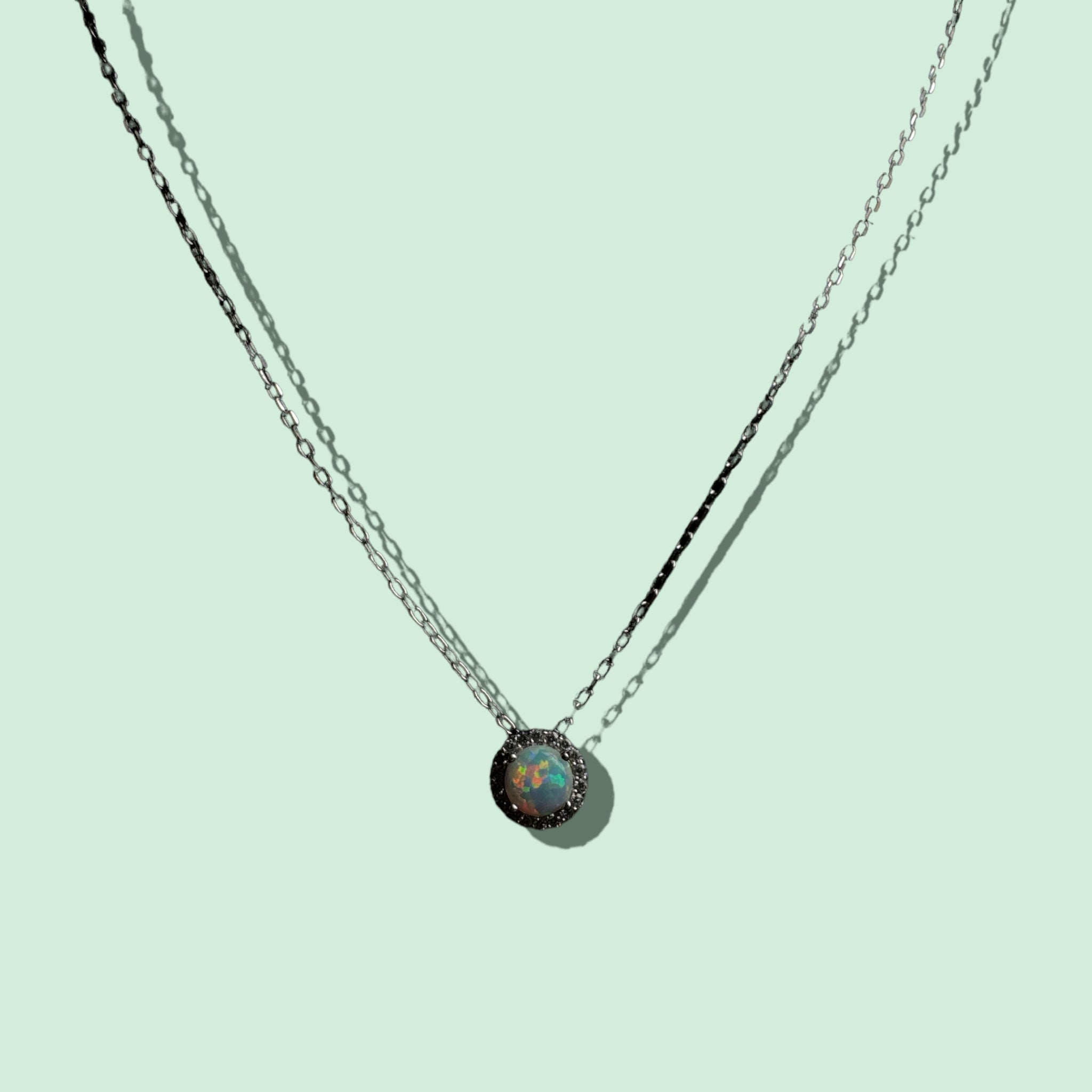 Synthetic opal encrusted with cubic zirconia sterling silver necklace