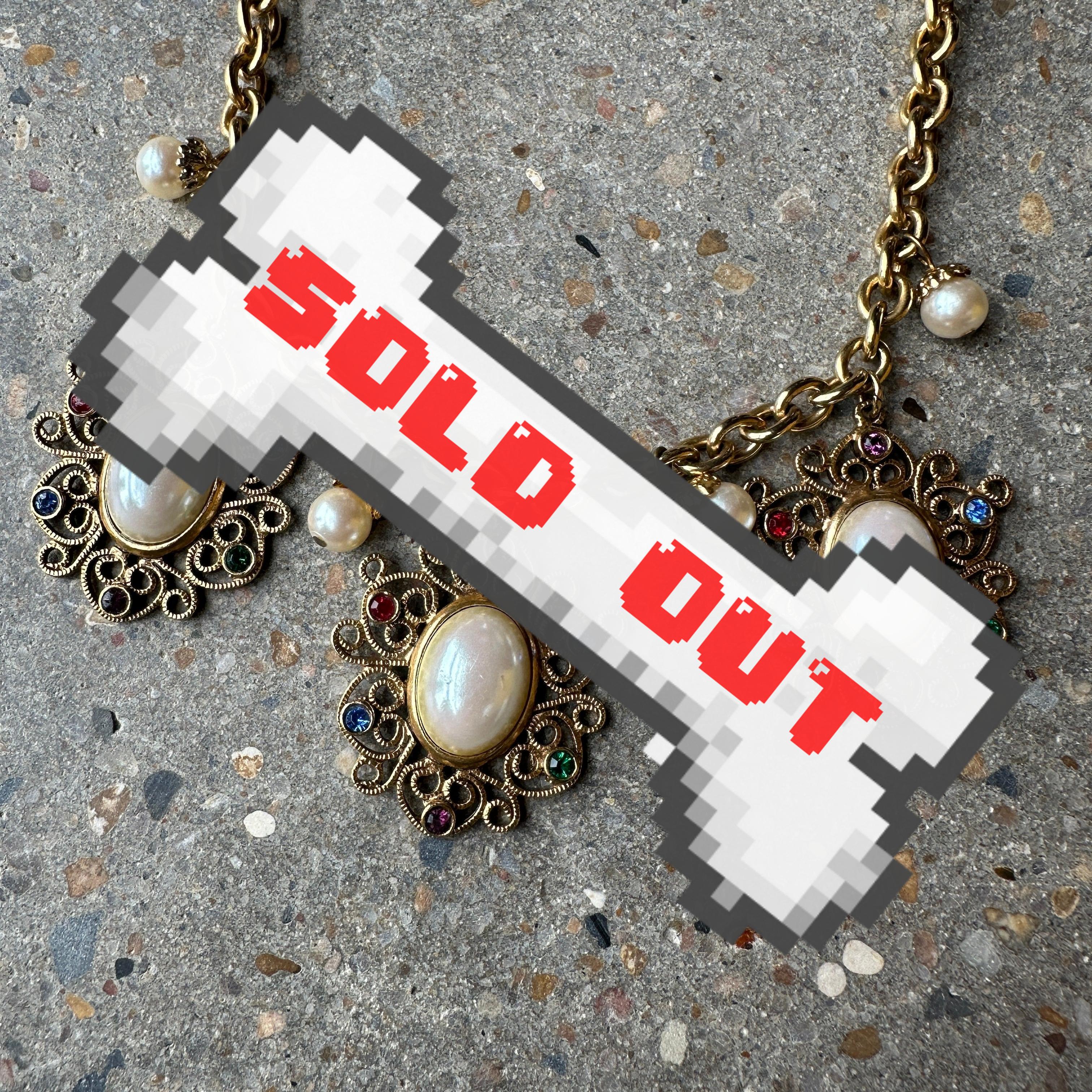 gold-tone necklace with 3 faux pearl and rhinestone pendants