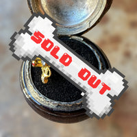 gold-tone vintage costume ring with false gems