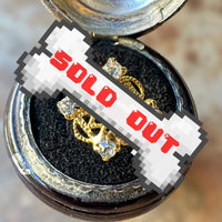 gold-tone vintage costume ring with false gems