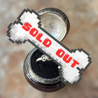 sterling silver 925 garnet cabochon ring with detail surrounding setting