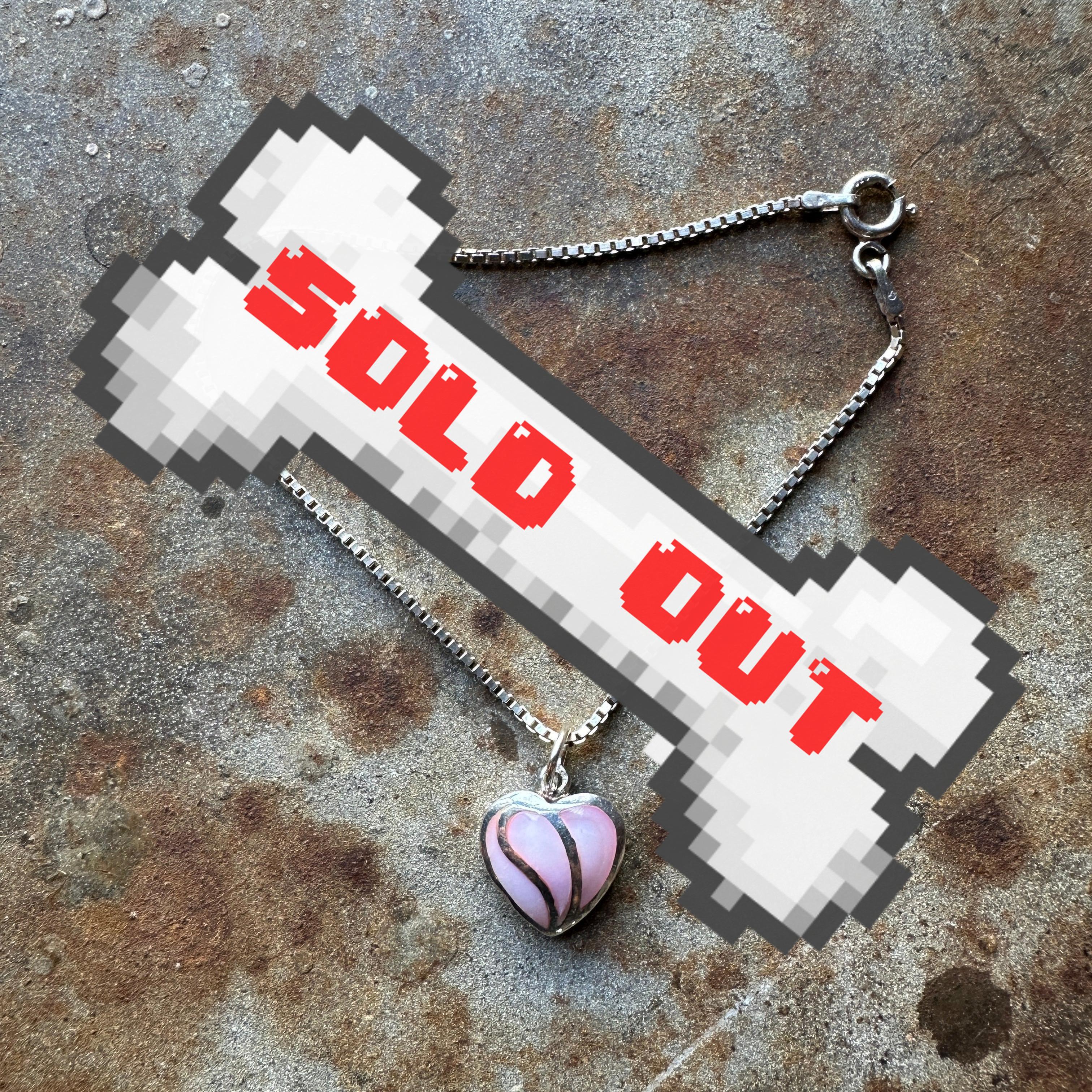 sterling silver bracelet with pink mother of pearl shell heart charm