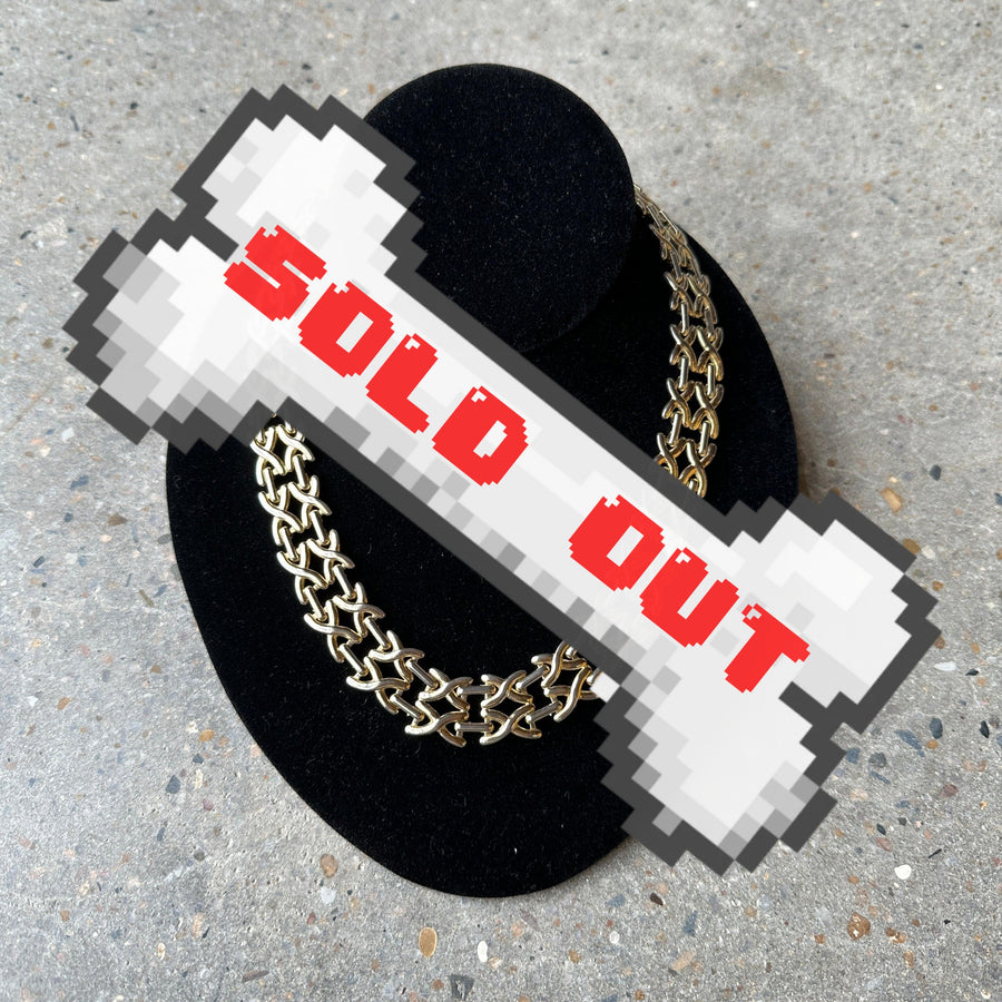 vintage gold-tone x motif necklace chromosomes
