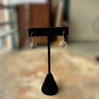 vintage sterling silver peridot cabochon earrings with floral setting
