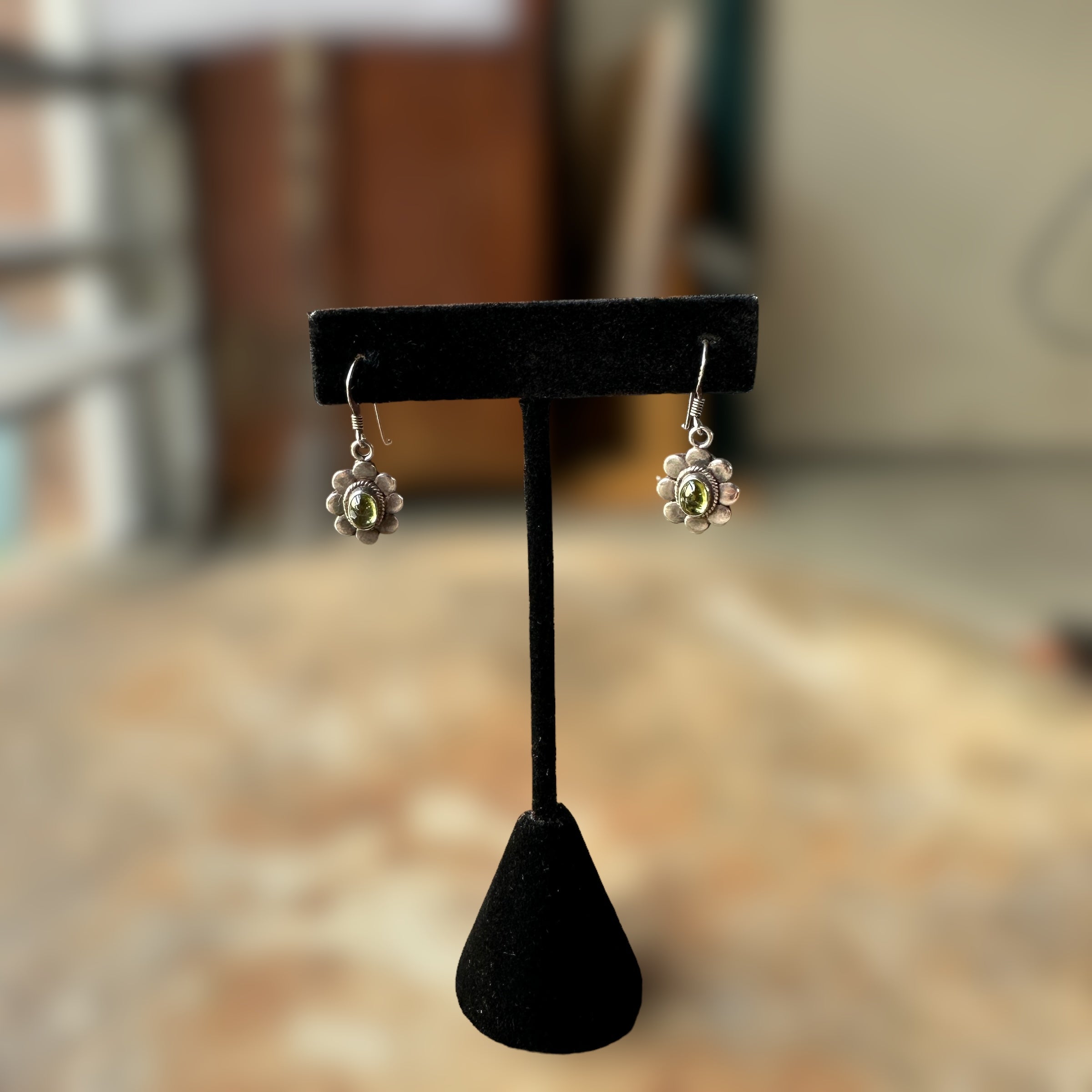 vintage sterling silver peridot cabochon earrings with floral setting