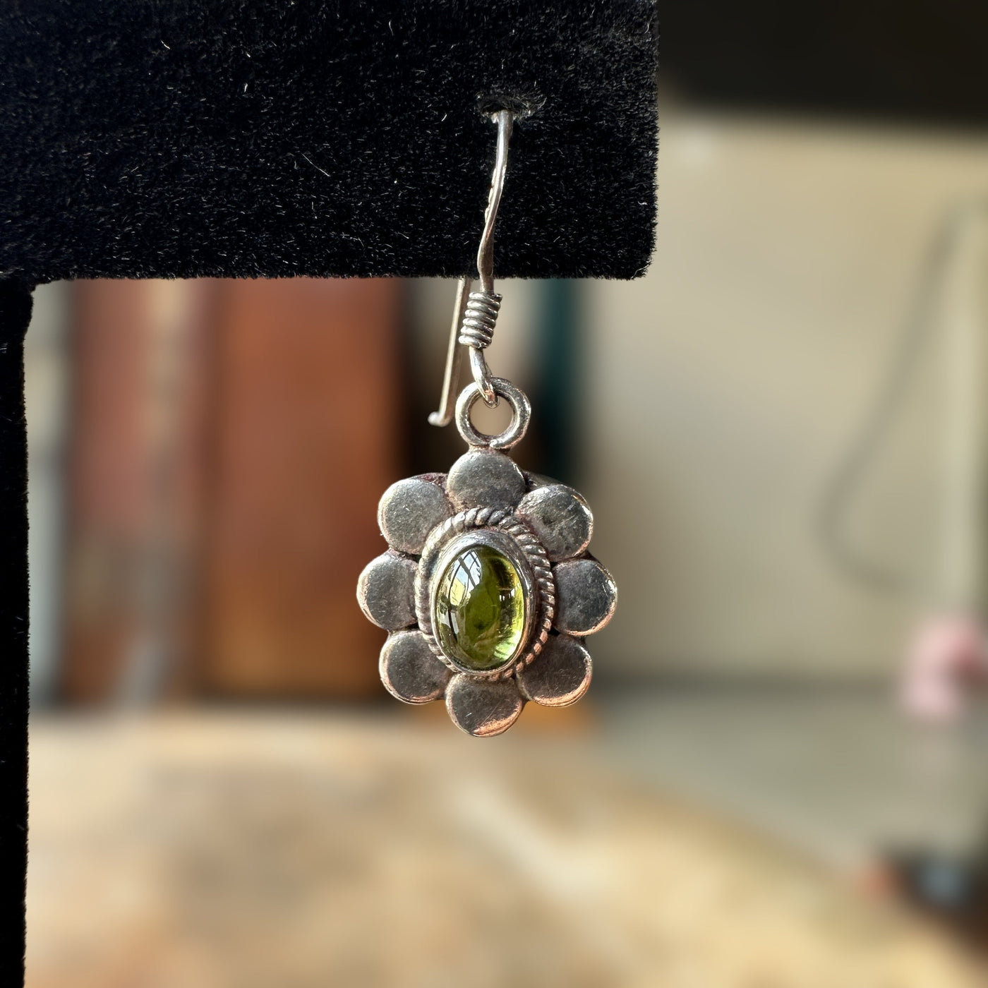 vintage sterling silver peridot cabochon earrings with floral setting