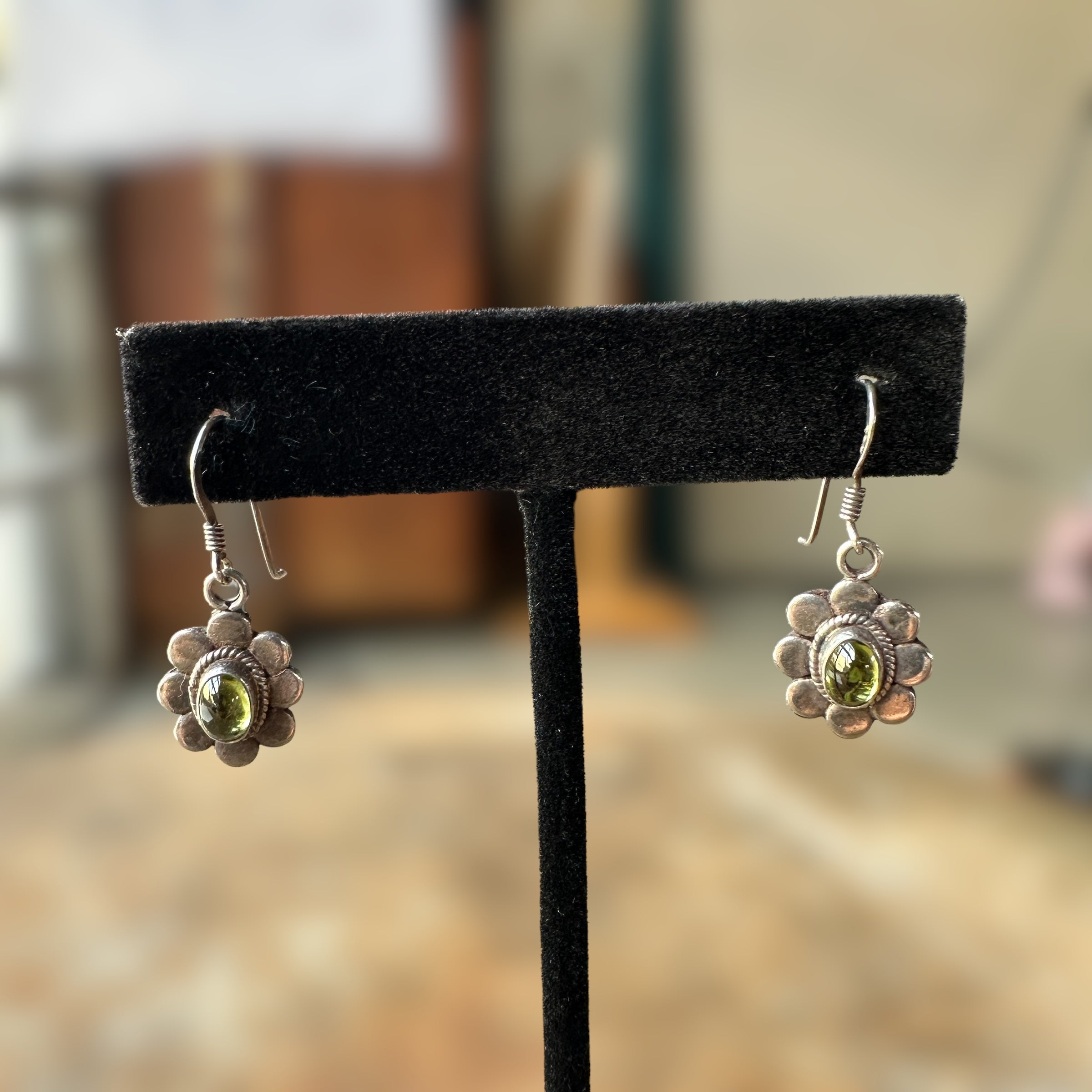 vintage sterling silver peridot cabochon earrings with floral setting